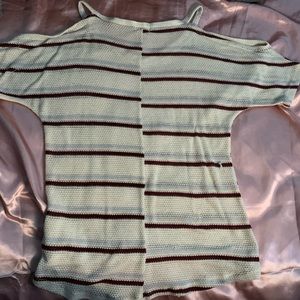 Striped shirt with open shoulder